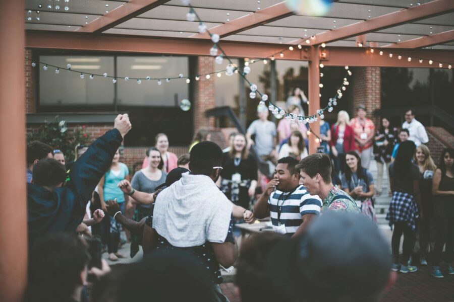 Group people dressed cocktail party outdoor evening