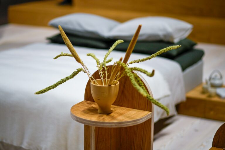 Bedside table small plant stacked books