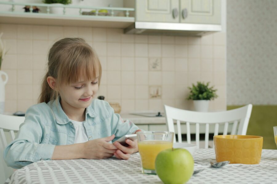 Child doing homework kitchen table