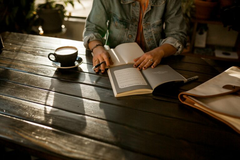 Person journaling notebook evening