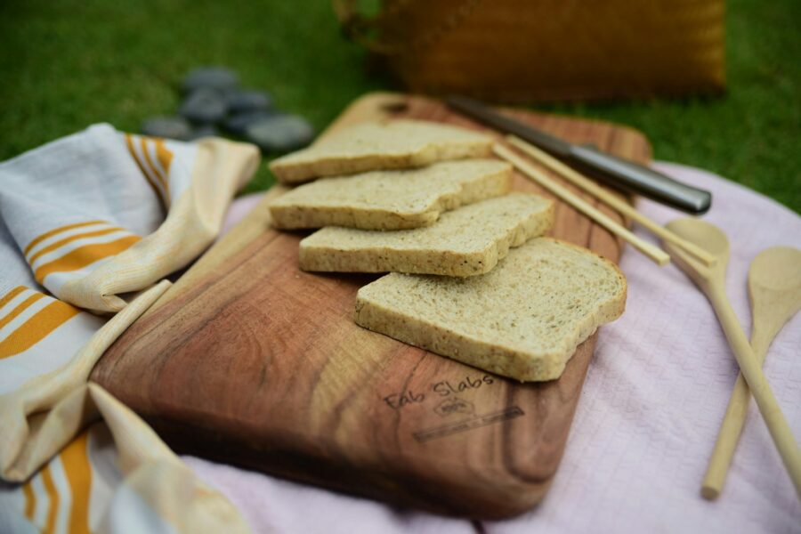Leftover bread slices wooden cutting board