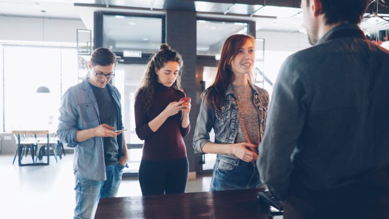Person standing line coffee shop