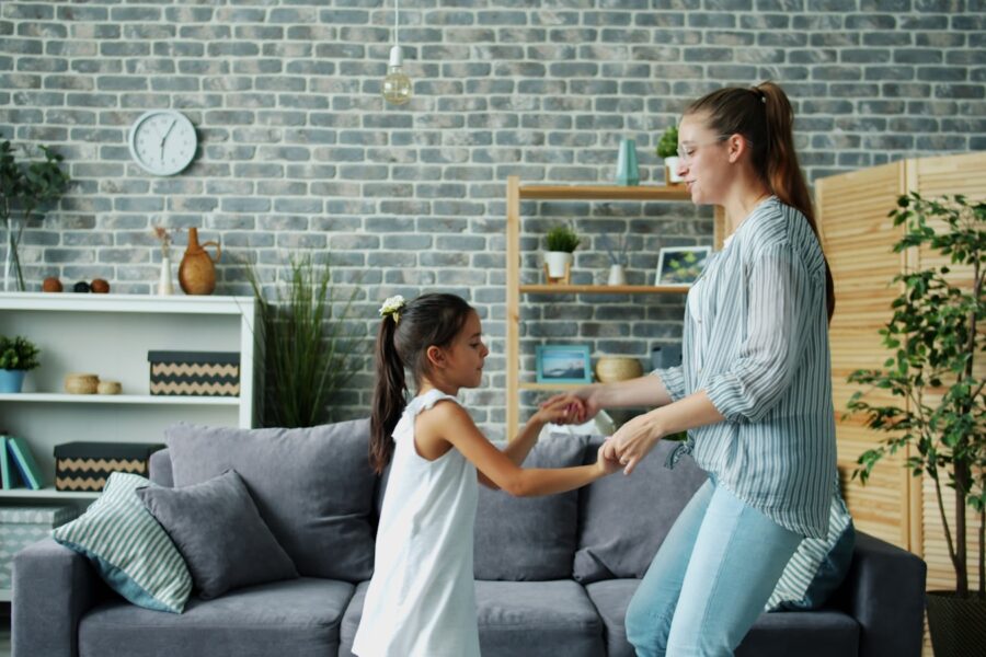 Siblings arguing living room couch toys