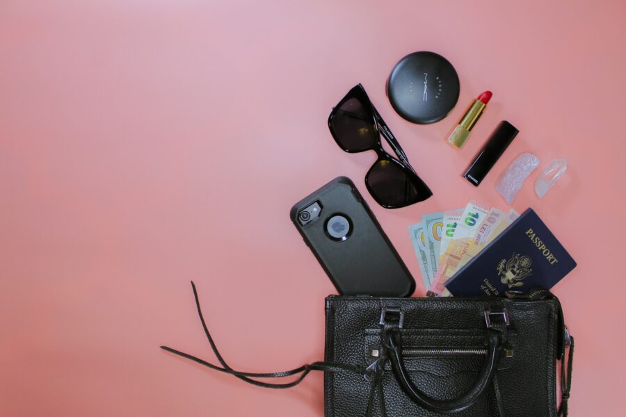 Flat lay minimalist travel clothes suitcase