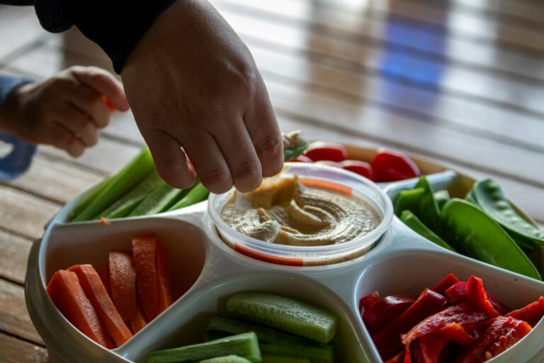 Lunch snack box hummus vegetables crackers