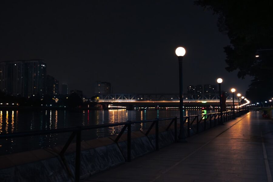 Evening city river promenade bench lights