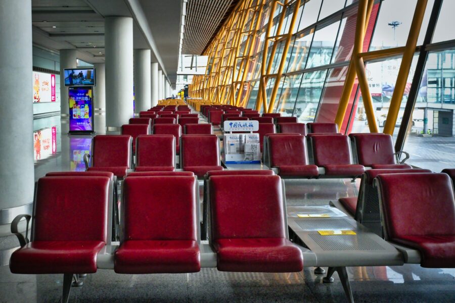 Calm airport terminal seating suitcase