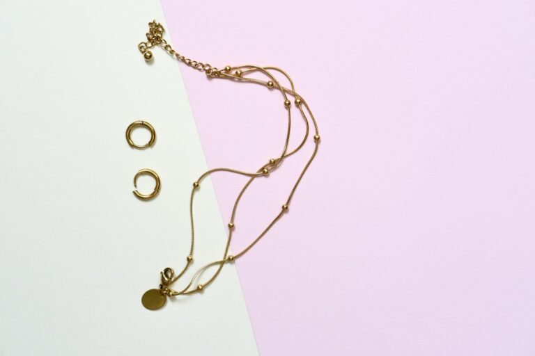 Leather belt gold hoop earrings crossbody bag