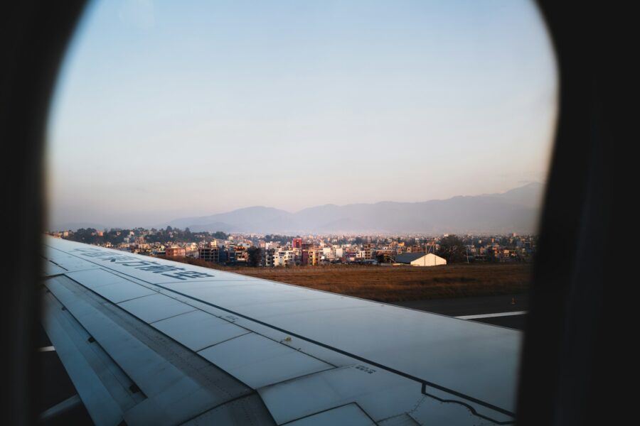 Airport terminal windows airplane city skyline