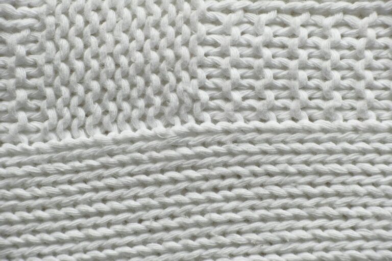 Textured knit sweater jeans close