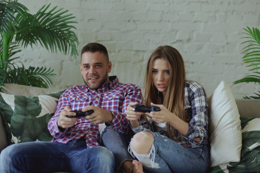 Mixed introvert extrovert couple relaxing living room sofa