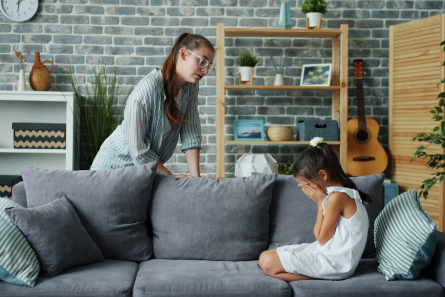 Parent teenager talking sofa