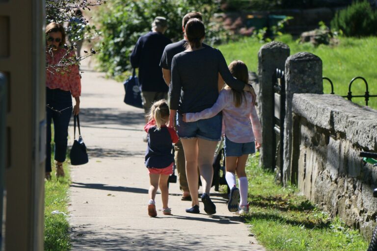 Parent teen walking outside