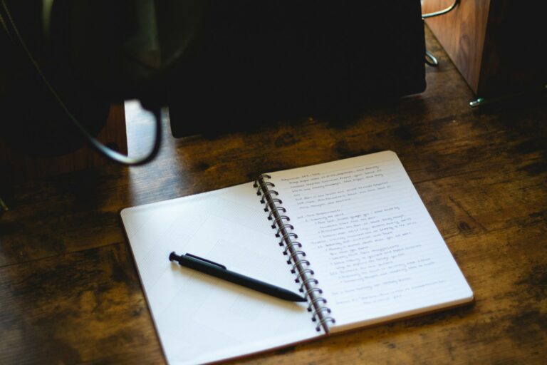 Notebook to-do list wooden desk