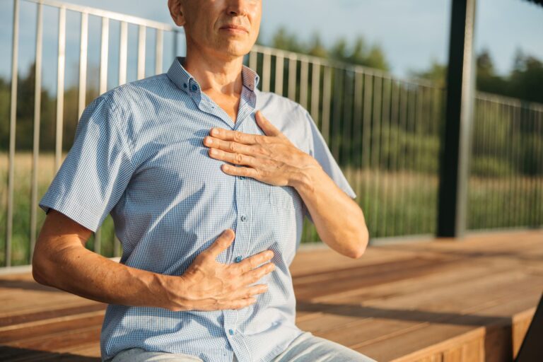 Close hands abdomen