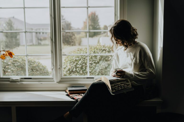 Woman sitting window