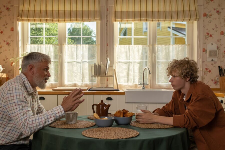 Family talking kitchen