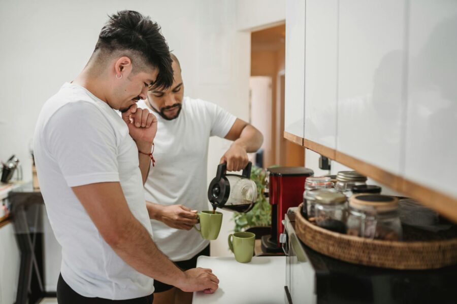 Couple kitchen morning light coffee mugs