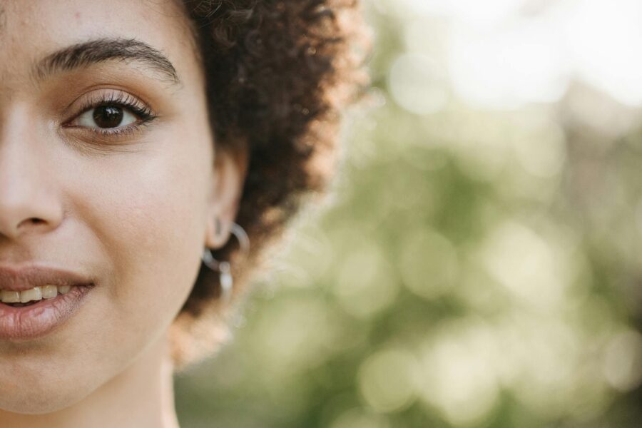 Natural makeup woman soft daylight closeup face