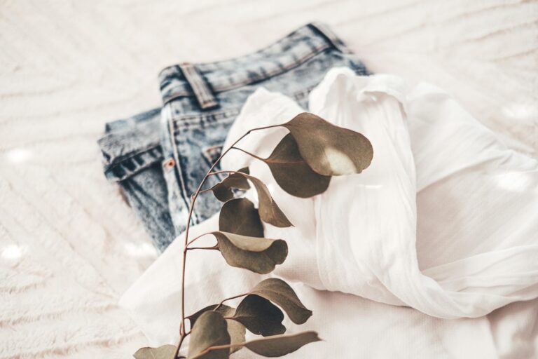 Flat lay capsule wardrobe neutral clothes