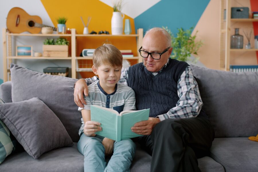 Grandparents sitting grandchildren