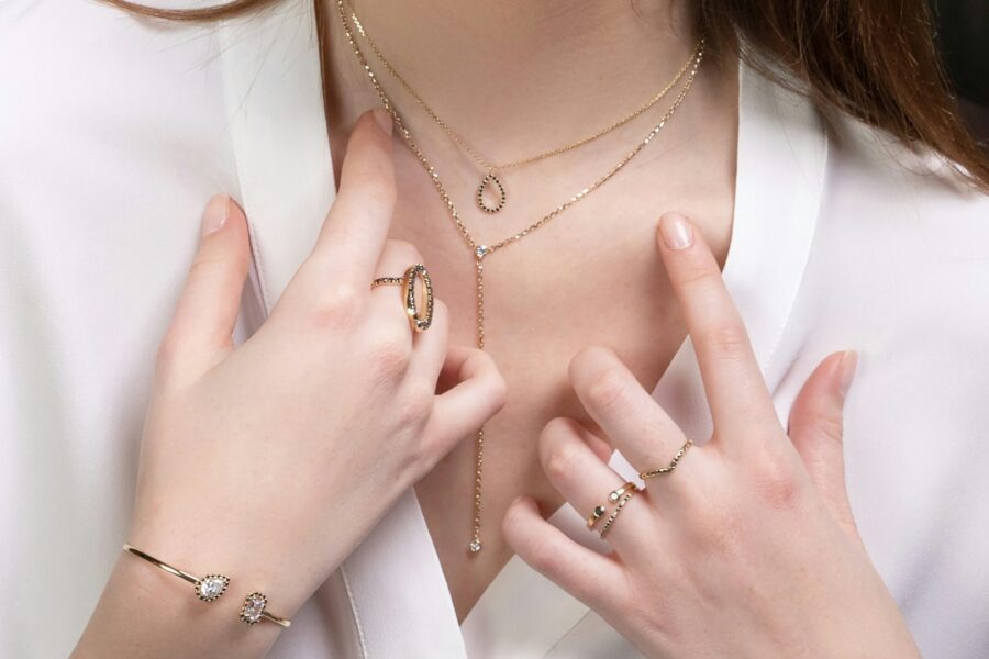 Woman layered necklaces
