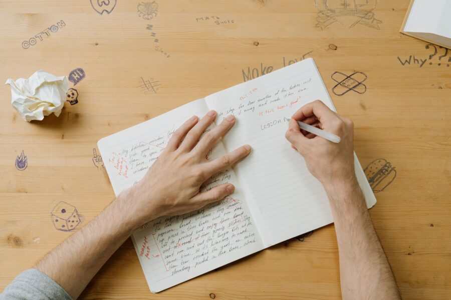 Thoughtful person writing