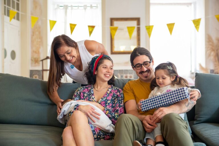 Family sitting sofa talking calmly living room
