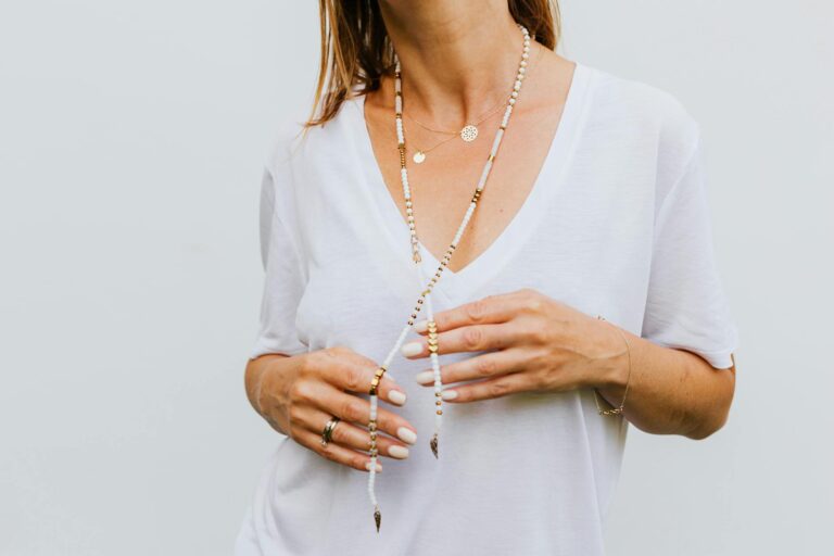Woman layered necklaces