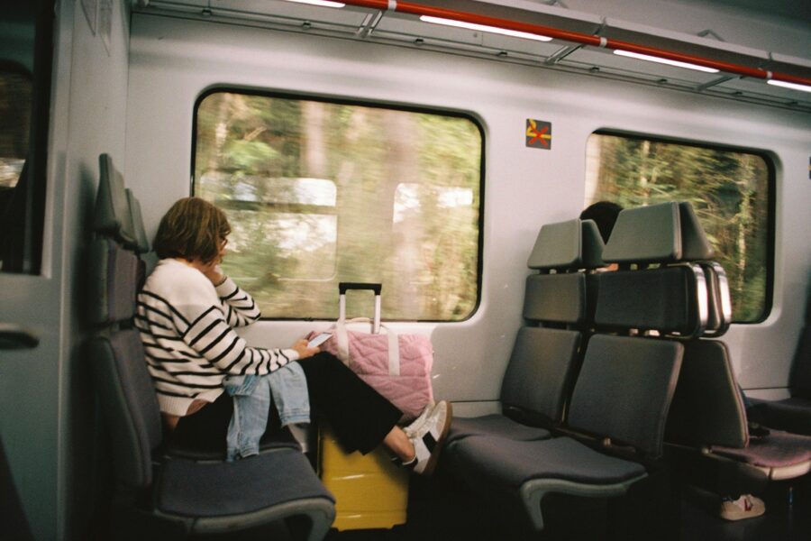 Train carriage window seat book snack