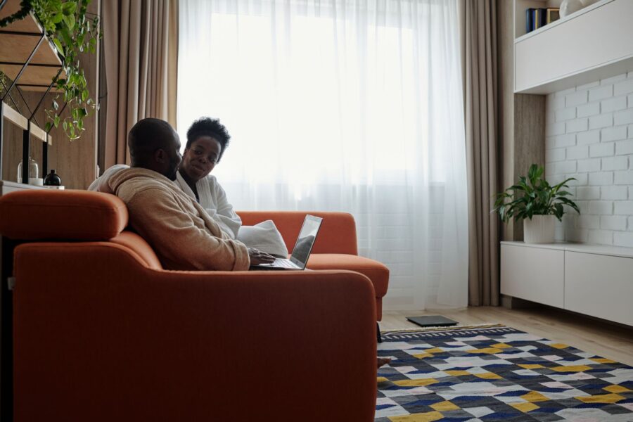 Couple sitting sofa