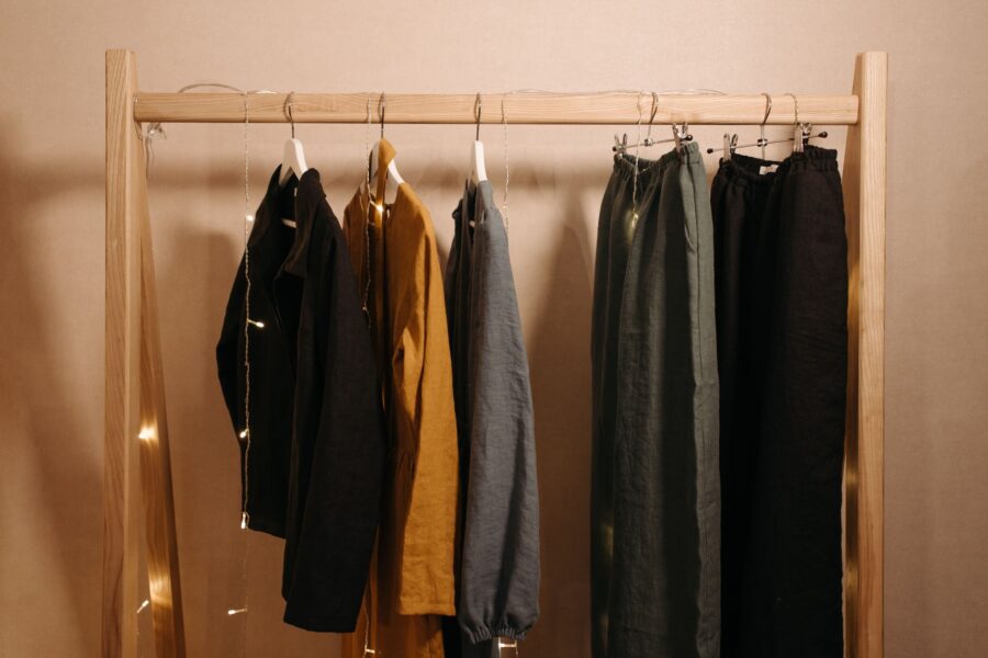 Wardrobe rack neutral clothes wooden hangers