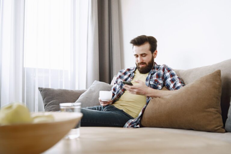 Person relaxing sofa