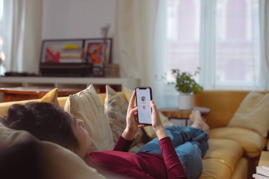 Person relaxing sofa