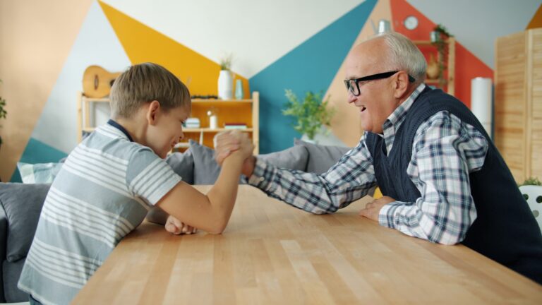 Adult son setting boundary father kitchen table