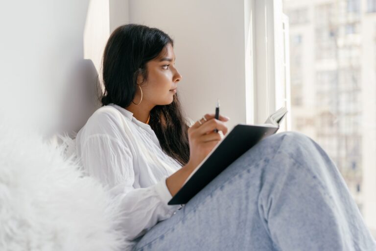 Man writing checklist