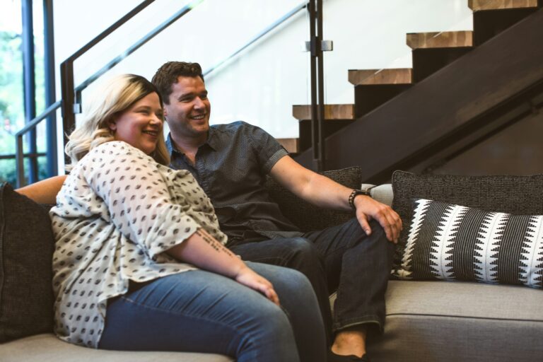Couple sitting sofa