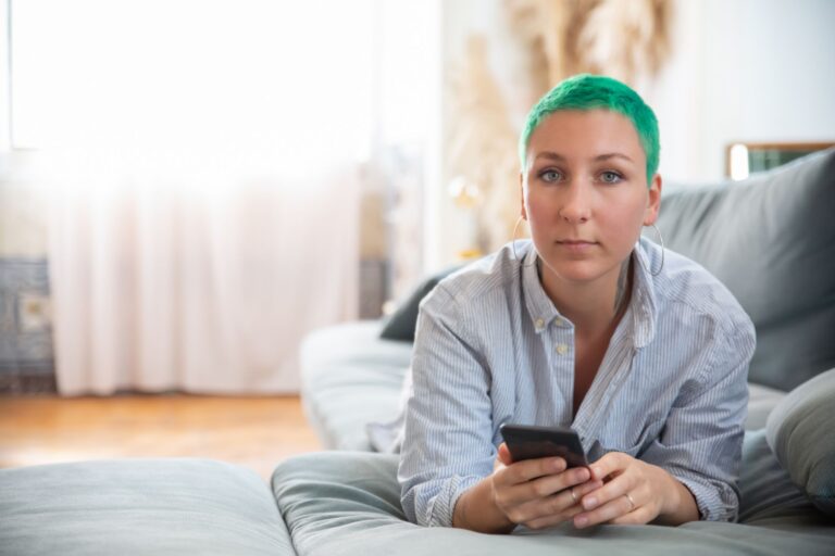 Person relaxing sofa