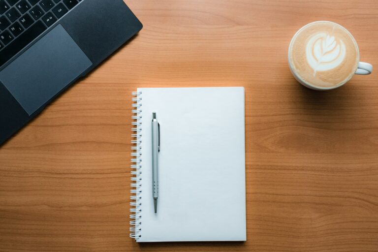 Weekly planner notebook coffee table pen