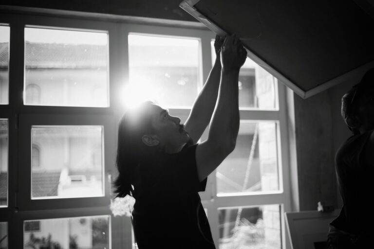 Person stretching window
