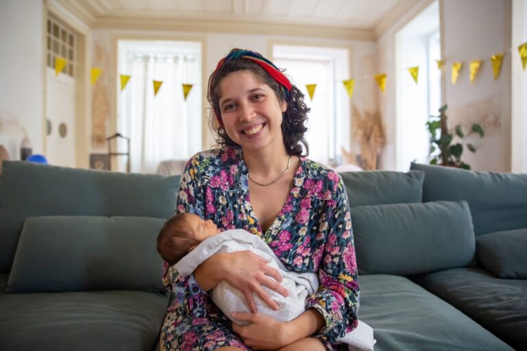 Friends visiting newborn