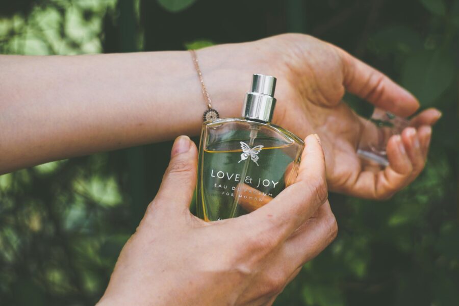 Perfume bottles hands