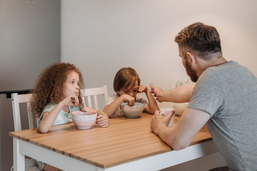 Family talking kitchen