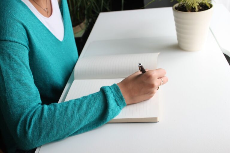 Person writing journal