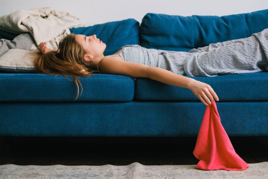 Woman resting sofa