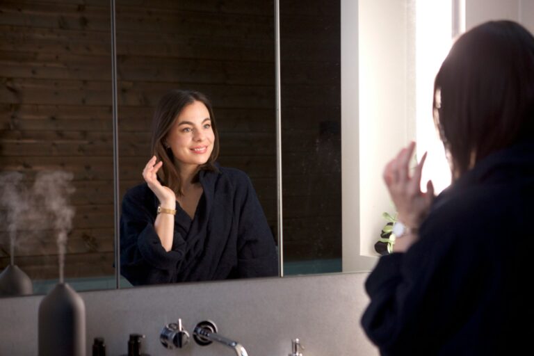 Woman bathroom mirror