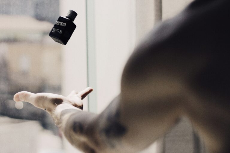Person applying perfume