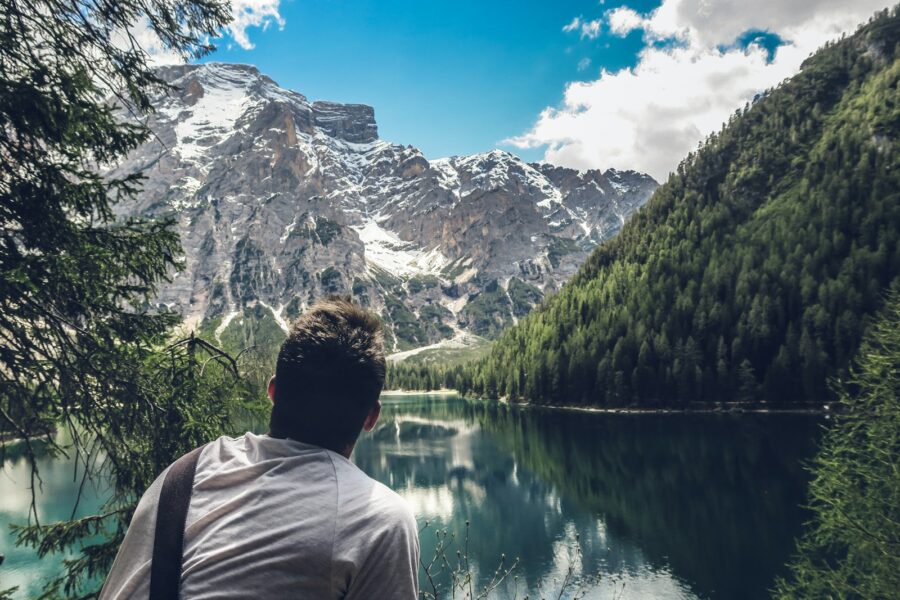 Hiker sitting lake