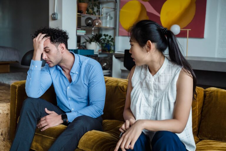 Couple sitting sofa