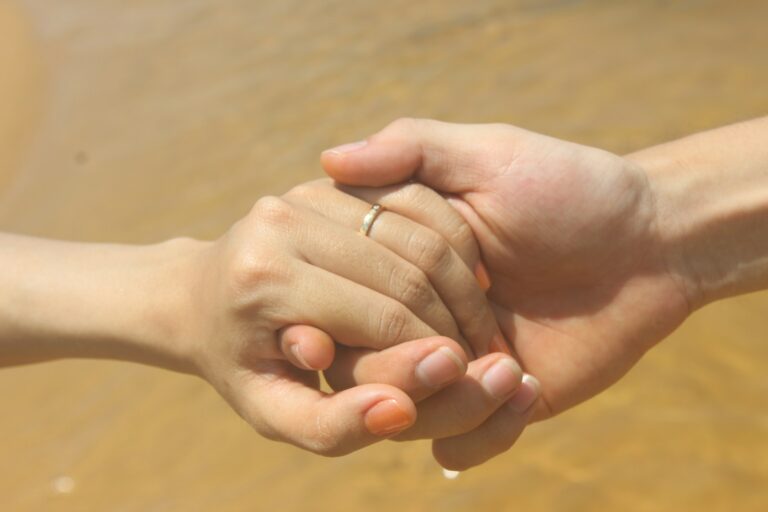 Couple holding hands